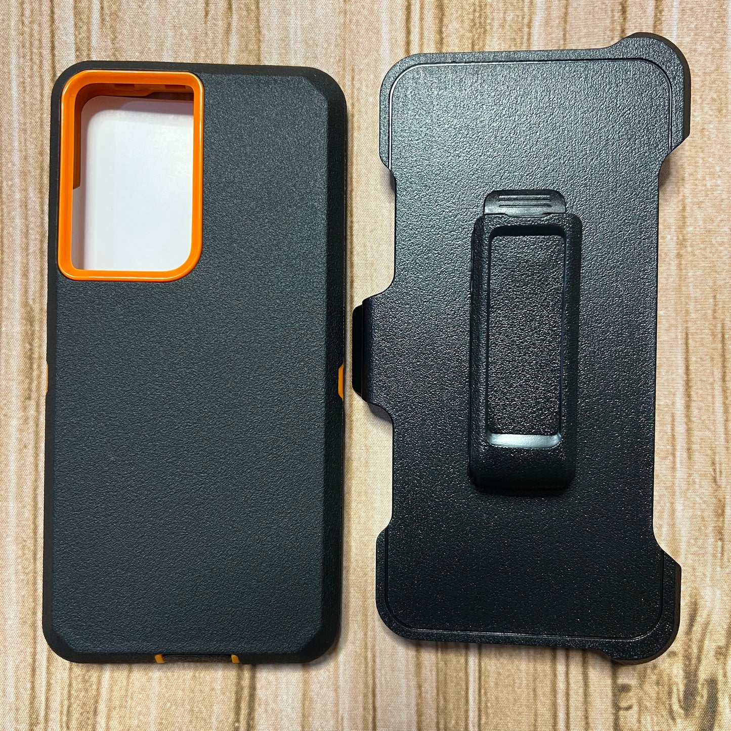 BLACK & ORANGE SAMSUNG S23+ OTTER BOX CASE