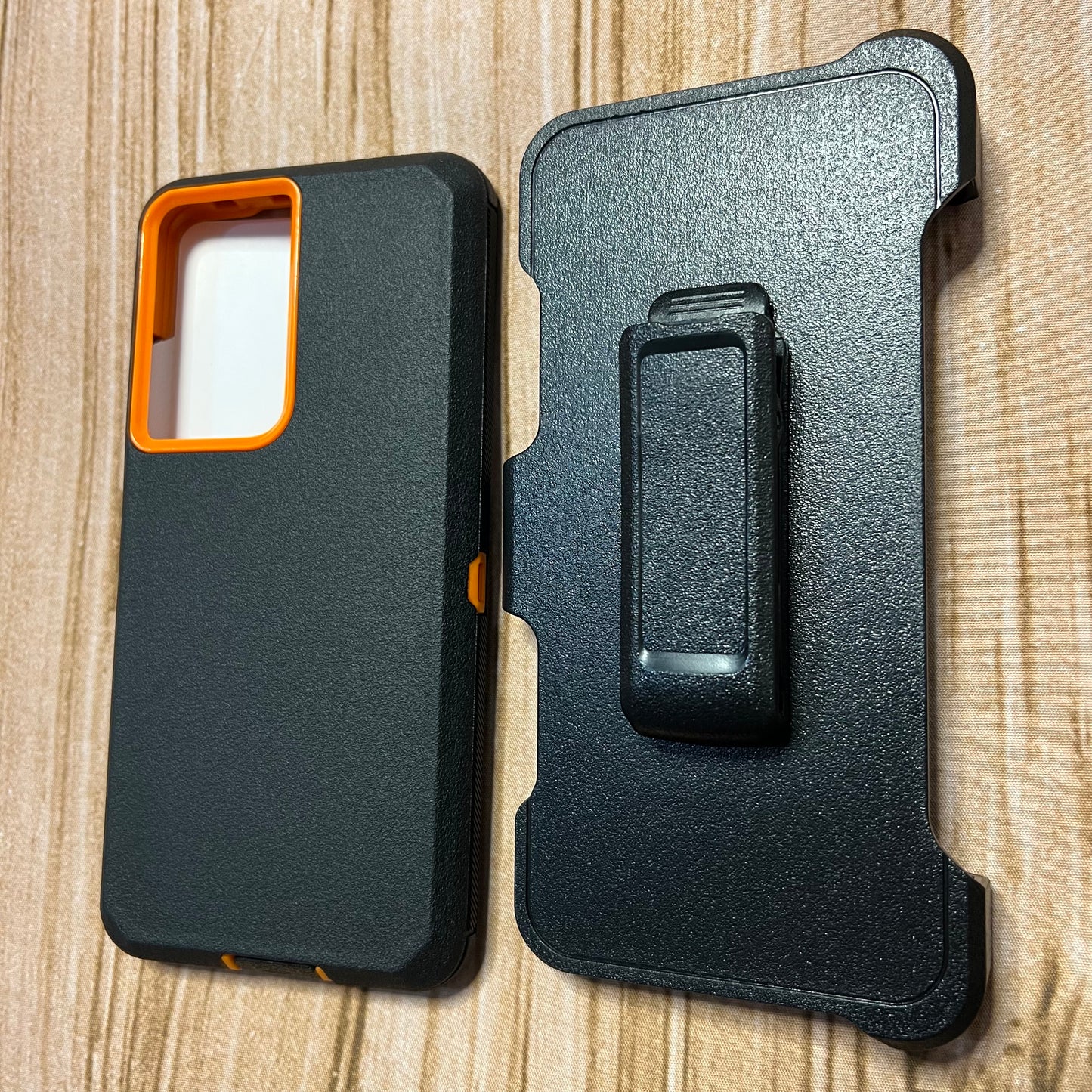BLACK & ORANGE SAMSUNG S23+ OTTER BOX CASE